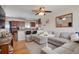 Inviting living room with an open layout, seamlessly connecting to the kitchen area at 3423 S Glencoe St, Denver, CO 80222