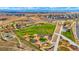 Aerial view of community featuring landscaping and green space at 6393 N Malaya St, Aurora, CO 80019