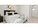 Comfortable bedroom features carpet and closet to optimize storage and relaxation at 6393 N Malaya St, Aurora, CO 80019