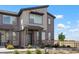 Beautiful home exterior with modern design elements and a well-maintained front yard at 6393 N Malaya St, Aurora, CO 80019