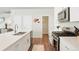 Modern kitchen with sleek countertops, stainless steel appliances, and ample cabinet space at 6393 N Malaya St, Aurora, CO 80019