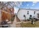 Side yard access with walkway and shed at 2229 S Bannock St, Denver, CO 80223