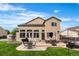 Spacious backyard featuring a large patio area at 133 Heritage Ave, Castle Rock, CO 80104