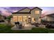 Inviting backyard patio perfect for outdoor entertaining with ample seating and string lights at 133 Heritage Ave, Castle Rock, CO 80104