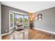 Bright living room featuring hardwood floors, a bay window, and stylish decor at 133 Heritage Ave, Castle Rock, CO 80104