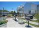 Community grilling area with multiple grills and a convenient setup at 2550 Lawrence St # 106, Denver, CO 80205