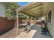 Covered patio with wood decking and backyard at 1641 Biscay Cir, Aurora, CO 80011
