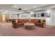Finished basement with large sectional sofa, ping pong table, and a projector at 2411 S Milwaukee St, Denver, CO 80210