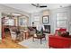 Inviting living room with hardwood floors, fireplace, and cozy seating arrangement at 2411 S Milwaukee St, Denver, CO 80210