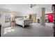 Spacious bedroom with a fireplace, and natural light, offering a peaceful retreat at 2411 S Milwaukee St, Denver, CO 80210