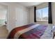Bedroom with closet and window at 512 Cardens Pl, Erie, CO 80516