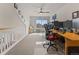 Bright home office with large window, neutral carpet, and ceiling fan at 512 Cardens Pl, Erie, CO 80516