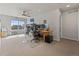 Office featuring two desks and large window at 512 Cardens Pl, Erie, CO 80516