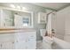 Full bathroom with a combined tub and shower, vanity with sink and medicine cabinet at 12338 W Dorado Pl # 206, Littleton, CO 80127
