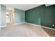Bedroom with carpet, access to bathroom and hallway at 12338 W Dorado Pl # 206, Littleton, CO 80127