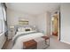 Comfortable bedroom with a view of the bathroom at 12338 W Dorado Pl # 206, Littleton, CO 80127