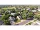 Aerial view of neighborhood, showcasing the home's proximity to community features and greenery at 19428 E Crestridge Cir, Centennial, CO 80015