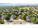 Residential area showcasing houses surrounded by lush greenery and community amenities at 19428 E Crestridge Cir, Centennial, CO 80015