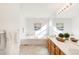 Bright bathroom with a large tub, vanity with dual sinks, and modern fixtures at 19428 E Crestridge Cir, Centennial, CO 80015