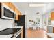 Updated kitchen with white countertops, stainless steel appliances and an open eat-in nook at 19428 E Crestridge Cir, Centennial, CO 80015