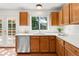 Well-lit kitchen featuring modern appliances and white subway tile backsplash at 19428 E Crestridge Cir, Centennial, CO 80015