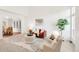 Bright living room with vaulted ceilings and an open concept layout to dining room at 19428 E Crestridge Cir, Centennial, CO 80015