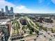Breathtaking aerial cityscape featuring brick buildings, bridges, green spaces, and city skyline at 1628 14Th St # 6A, Denver, CO 80202