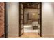 Bedroom boasts a decorative lighting fixture, wood floors and a large doorway at 1628 14Th St # 6A, Denver, CO 80202