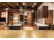 Modern kitchen with marble countertops, wine fridge and stainless steel appliances at 1628 14Th St # 6A, Denver, CO 80202