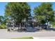 Reunion Coffee House building exterior with covered porch and landscaping at 16347 E 111Th Dr, Commerce City, CO 80022