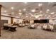 Expansive banquet hall features elegant decor, seating and large buffet table at 23590 E Jamison Pl, Aurora, CO 80016