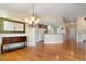 Charming dining area offering a view of kitchen and natural lighting at 23590 E Jamison Pl, Aurora, CO 80016
