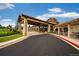 Beautiful community clubhouse with a covered entrance and well-maintained landscaping at 23590 E Jamison Pl, Aurora, CO 80016