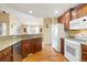 Functional kitchen with stainless steel appliances, granite countertops and breakfast bar at 23590 E Jamison Pl, Aurora, CO 80016