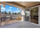 Enjoy views from the private patio accessible through sliding glass doors at 23590 E Jamison Pl, Aurora, CO 80016