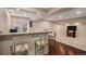 Finished basement wet bar with view to adjacent Gathering room, perfect for entertaining at 7004 S Addison Ct, Aurora, CO 80016