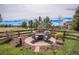Cozy backyard fire pit area with comfortable seating, perfect for outdoor gatherings at 7004 S Addison Ct, Aurora, CO 80016