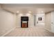 Finished basement Gathering room with big screen TV and access to other rooms at 7004 S Addison Ct, Aurora, CO 80016