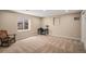 Finished basement office and bedroom area with natural light at 7004 S Addison Ct, Aurora, CO 80016