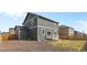 Expansive backyard with patio space and lush lawn, ideal for recreation at 8388 E 132Nd Pl, Thornton, CO 80602