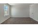 Light-filled bedroom with soft carpet and closet space, promoting relaxation at 8388 E 132Nd Pl, Thornton, CO 80602