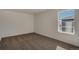 Bright bedroom with large window and plush carpet, providing a calm space at 8388 E 132Nd Pl, Thornton, CO 80602