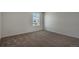 Inviting bedroom with natural light and cozy carpeting, perfect for rest at 8388 E 132Nd Pl, Thornton, CO 80602