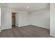 Bright, airy bedroom with neutral walls and carpet, with a closet, offering a versatile space at 8388 E 132Nd Pl, Thornton, CO 80602