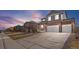 Beautiful two-story home with a brick facade and spacious three-car garage at 8388 E 132Nd Pl, Thornton, CO 80602