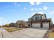 Stately two-story home with attached garage and manicured front yard at 8388 E 132Nd Pl, Thornton, CO 80602