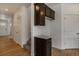 Hallway featuring modern finishes and built-in storage at 8388 E 132Nd Pl, Thornton, CO 80602