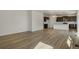 Bright open-concept layout seamlessly blends living, dining, and kitchen areas for modern living at 8388 E 132Nd Pl, Thornton, CO 80602