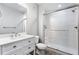 Bathroom featuring a glass enclosed shower, modern vanity, and neutral colors at 16069 Pikes Peak Dr, Broomfield, CO 80023
