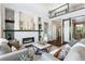 Spacious living room with a modern fireplace and comfortable seating at 16069 Pikes Peak Dr, Broomfield, CO 80023